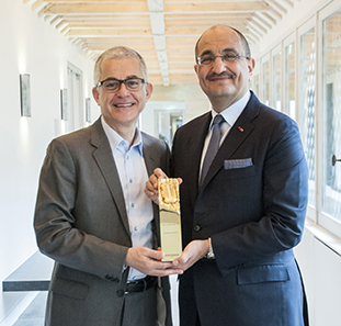 Mr. Albert Bensoussan, CEO of the luxury Watches and Jewellery division in Kering, the mother company of Boucheron, presented Mr. Bader Al-Darwish, Chairman and Managing Director of  Darwish Holding, with an award honoring Fifty One East for having the best performance in the Middle East.